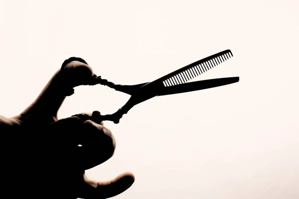 Scissors Hand Hairdresser Silhouette Light Background — Stock Photo, Image