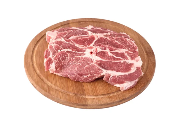Rauw Vers Gesneden Varkensvlees Een Houten Ronde Plank Geïsoleerd Witte — Stockfoto