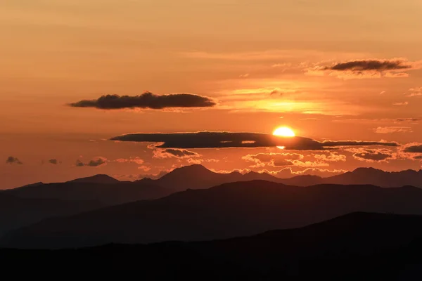Colorful Landscape Circular Disc Sun Clouds Contours Mountains Sunrise — Stock Photo, Image
