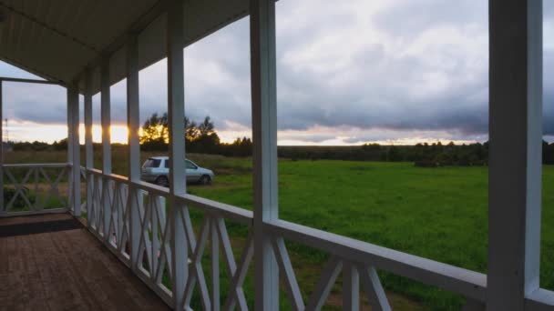 Beautiful sunset from the veranda of the summer cottage. Timelapse — Stock Footage Beautiful Sunset Veranda Summer Cottage Timelapse Royalty Free Stock Footage