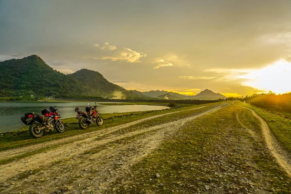 Purwakarta, West Java, Indonesia (03/30/2018) : Purwakarta, West Java, Indonesia (03/30/2018) : The rider is touring with his motorcycle through the Jatiluhur Dam side which is commonly called Parang