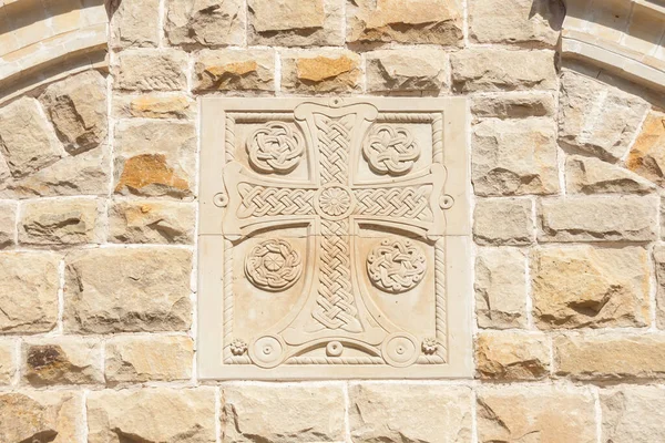 orthodox cross carved in stone