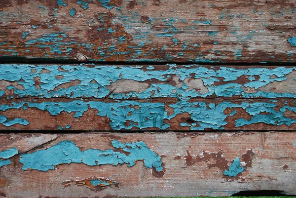 Texture of wooden boards with shabby blue paint