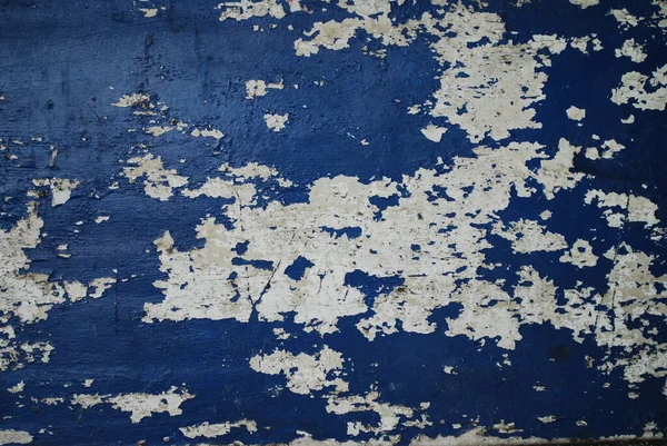 Texture of wooden boards with shabby blue paint