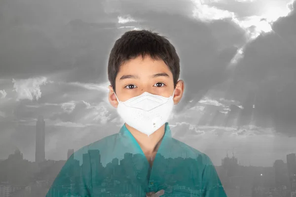 Bangkok\'s air quality dangerous levels for kid, boy wear mask protect from dust PM 2.5