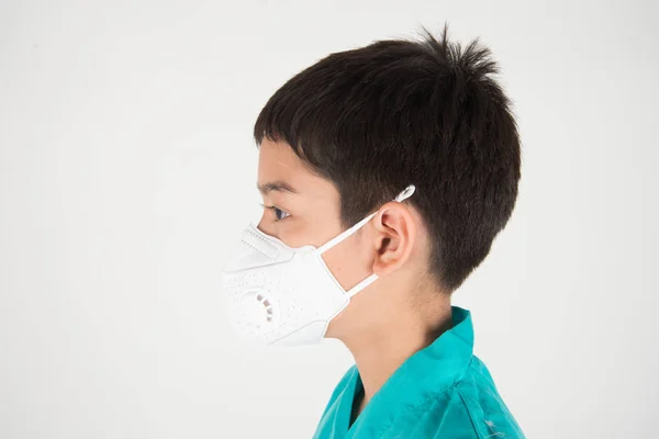 Bad polution air quality dangerous levels for kid get sick, boy wear mask protect from dust PM 2.5