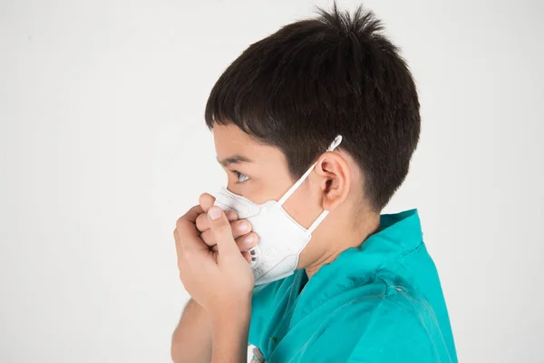 Bad polution air quality dangerous levels for kid get sick, boy wear mask protect from dust PM 2.5