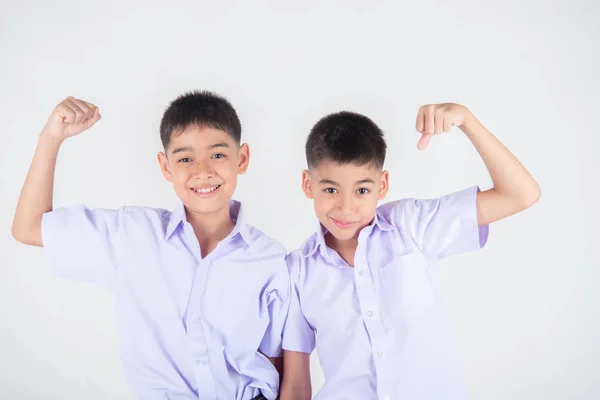 Piccolo Asiatico Fratello Ragazzi Studente Uniforme Posa Insieme Sfondo Bianco — Foto Stock