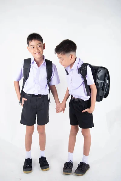 Kleine Asiatische Geschwister Jungen Studentenuniform Posieren Zusammen Auf Weißem Hintergrund — Stockfoto