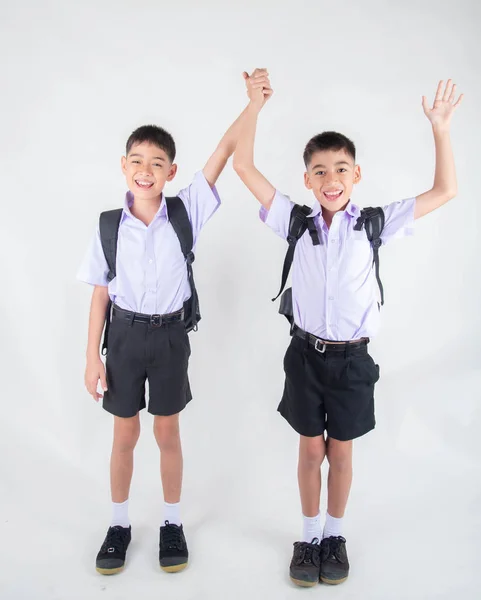 Piccolo Asiatico Fratello Ragazzi Studente Uniforme Posa Insieme Sfondo Bianco — Foto Stock