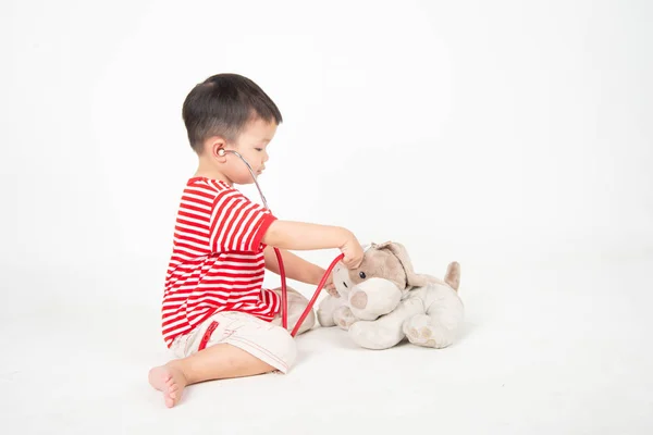 Little Boy Pretend Doctor Checking Dog Doll — Stock Photo, Image