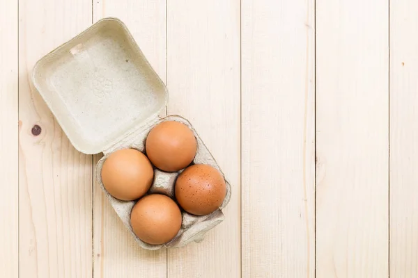 Eggs Carton Wooden Table Top — Stock Photo, Image
