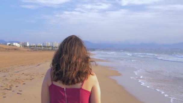 Girl Red Dress Walks Beach Summer Day — Stock Video