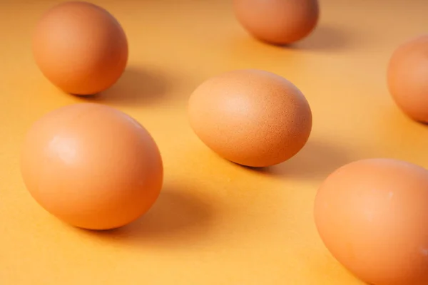 Organic Fresh Raw Eggs Yellow Background — Stock Photo, Image