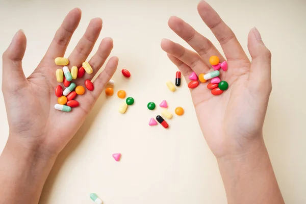 Hands Man Holding Colourful Medicine Pills Isolate White Yellow Background — Stock Photo, Image