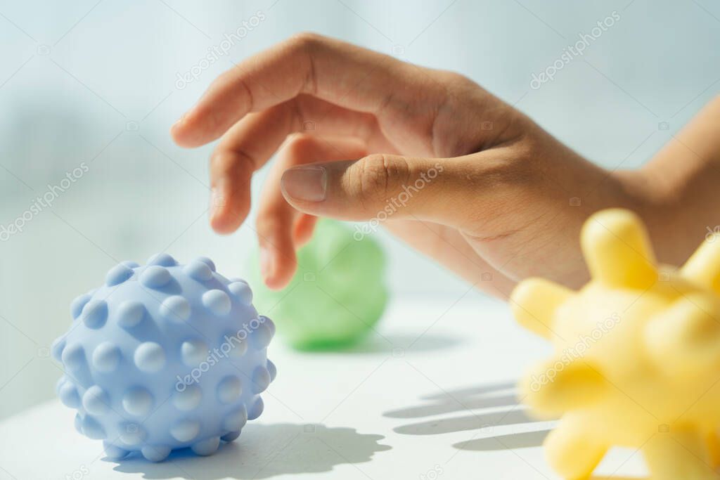 Woman hand touching covid-19 virus in the air with barehand.