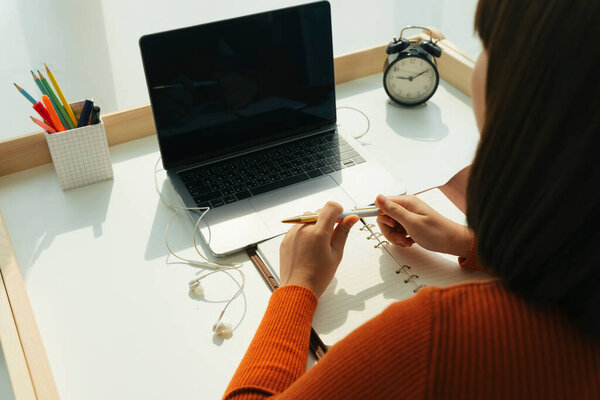 Asian student study or learn from home during covid-19 epidemic.