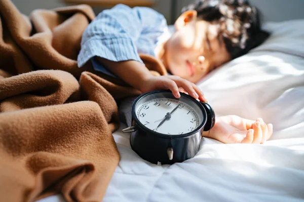 Cropped Image Alarm Clock Boy Hands Hold While Lie Bed — Stock Photo, Image