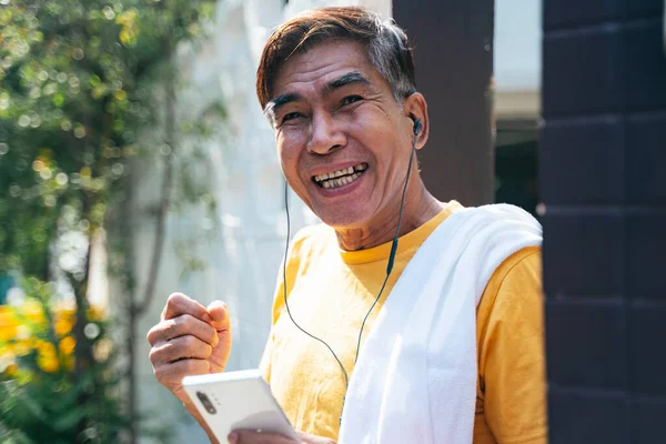 Old Man Yellow Shirt Standing Front His House Wave His — Stock Photo, Image