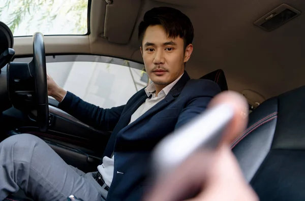 Asian Thai Businessman Driving Car Reaching Hand Camera — Stock Photo, Image