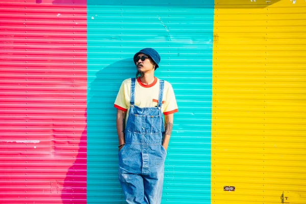 Man Yellow Shirt Denim Overalls Standing Sitting Front Colorful Shutter — Stock Photo, Image