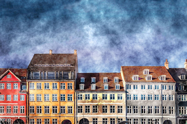 painted houses with windows and blue sky with clouds 