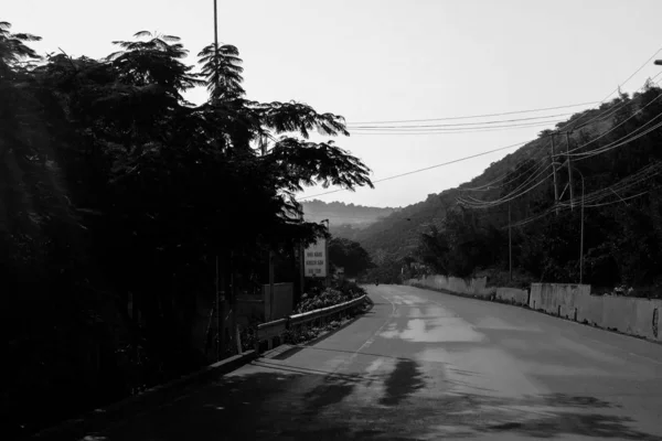 View of the road in the mountains in black and white
