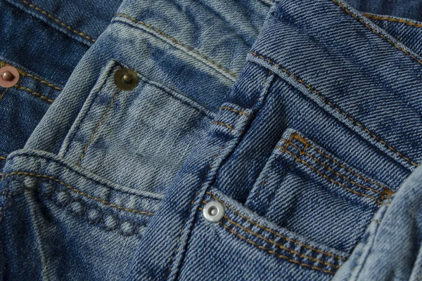 Blauw denim jeans broek element achtergrond. — Stockfoto