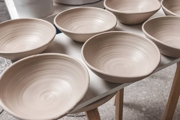 Many Raw Ceramic Bowls Made White Clay Waiting Putting Pottery — Stock Photo, Image