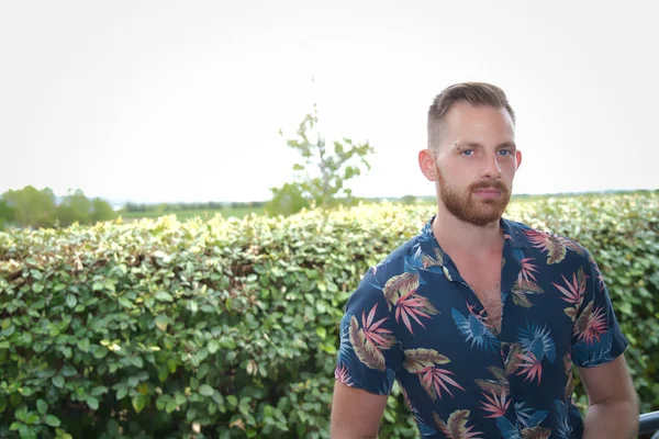 a red beard young male model portrait