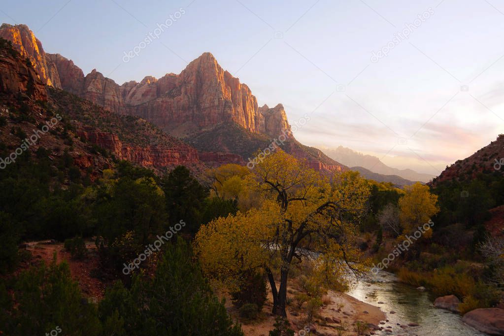 The last rays of light hitting the mountains, river and forests beauty of Zion National Park creating awe inspiring colors.