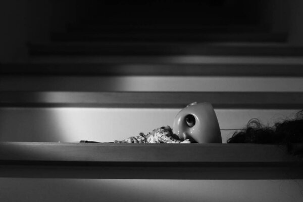 Ghost doll lying on the stairs, Halloween day