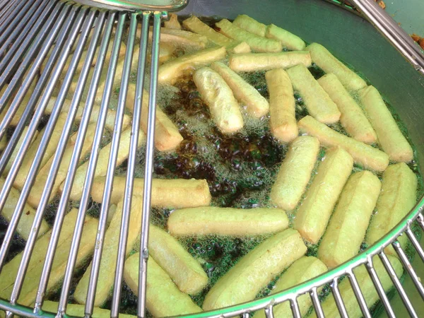 Tofu sliced fried in boiling oil. Fried tofu is an Asian snack. Fried tofu is popular and top protein sources.