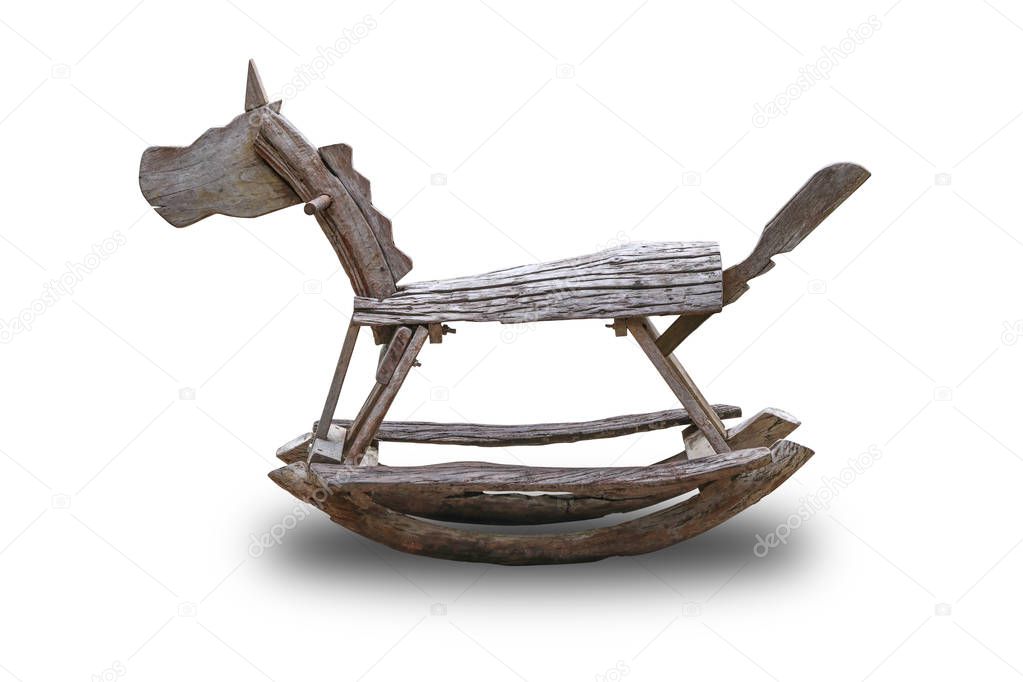 Rocking horse made of wood isolated on white background.