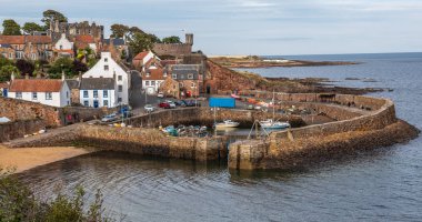 The old Harbour in the historic village of Crail in the East Neuk of Fife, Scotland clipart