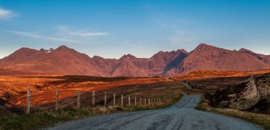 The road to Glen Brittle with The Cuillin hills in the background on the Isle of Skye, Scotland clipart