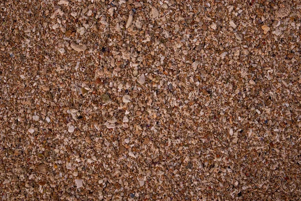 Sand background. Sand texture. Top view. Background for design. Close up of sand pattern.