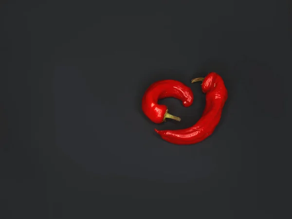 Fekete Háttér Előtt Két Piros Forró Chili Paprika Közelíti Fotók — Stock Fotó