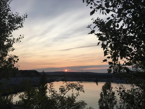 Sunset time. Sky view. Sky. Clouds. Sea view. Lake.