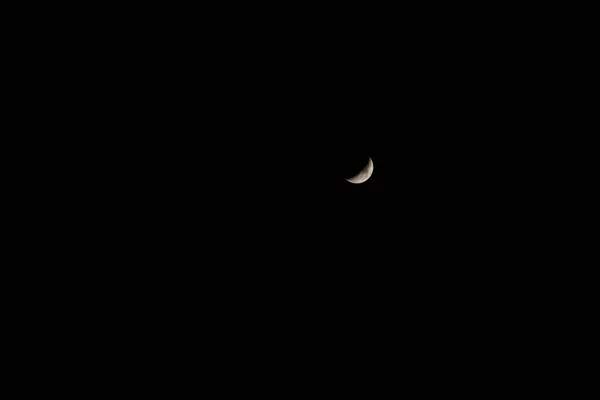 The moon on the dark sky.Real Picture of Moon.Half Moon without cloud at night.