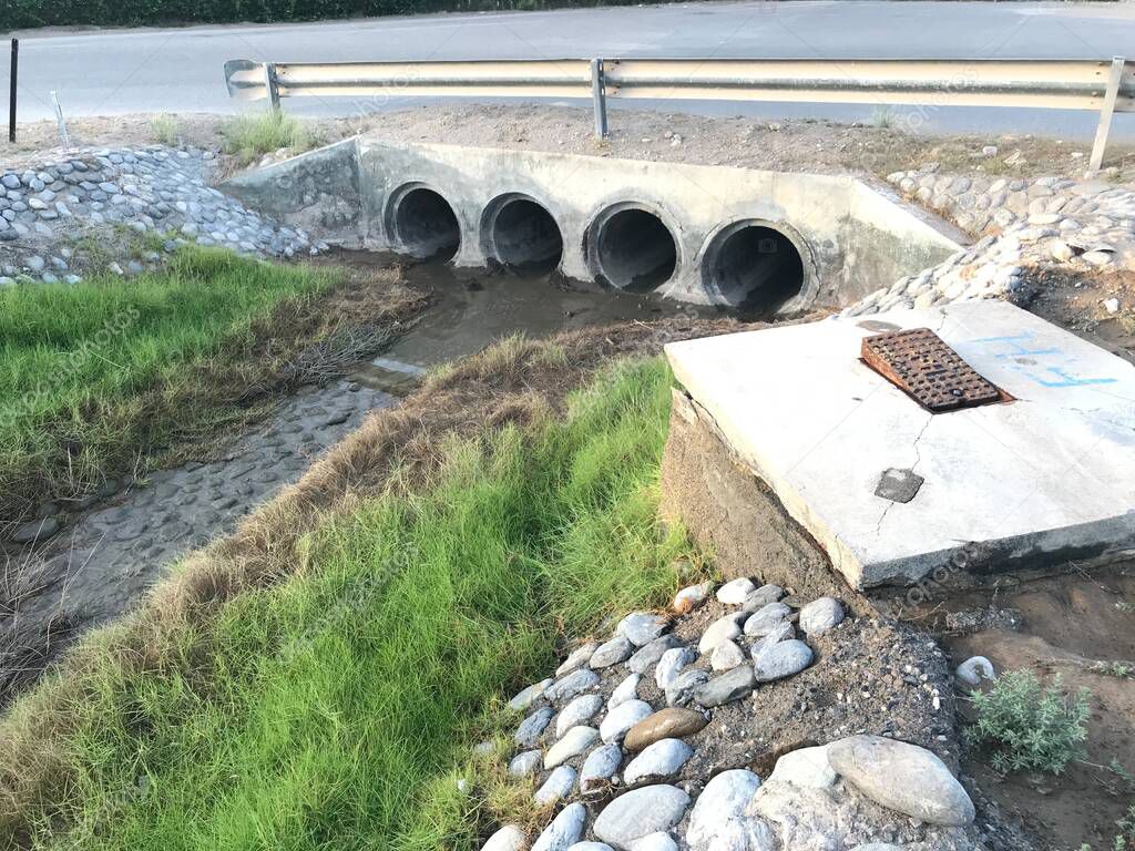 Concrete Pipe Road crossing culvert for drainage purpose to flow into canal or storm water drainage system which ends at ocean