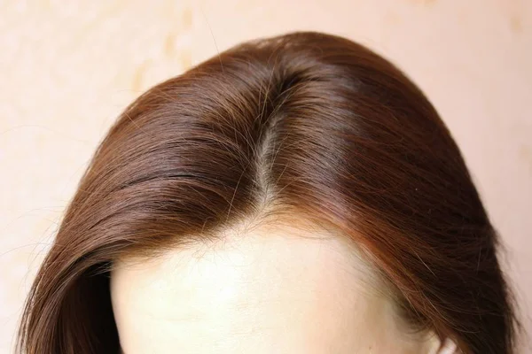 Cabelo das mulheres é uma vista superior close-up — Fotografia de Stock