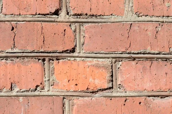 Old brick wall on a sunny day close up. Abstract background