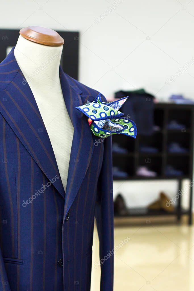 Mannequins in a tailor shop and tailored suits. Concept of: tailoring, businessman, elegance.