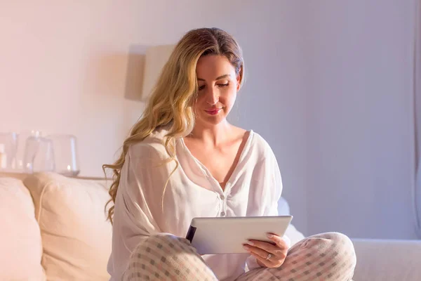 Elegant Middle Aged Woman Sitting Couch Reading News Tablet Using — Stock Photo, Image