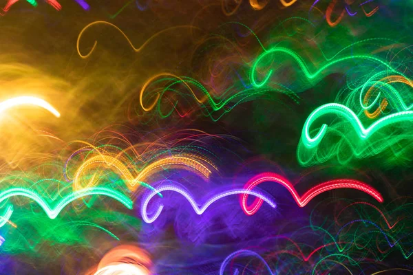 Leuchtende Neonwellenlinien ähnlich wie Meereswellen. — Stockfoto