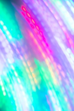 Diyagonal neon çizgilerin soyut bulanık Parlak arka planı.