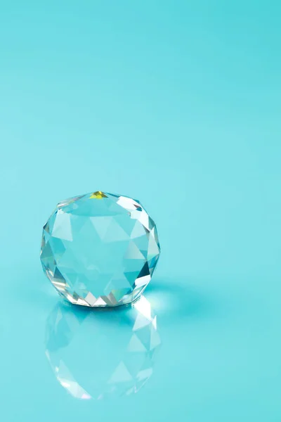 crystal ball on blue background (creative concept)