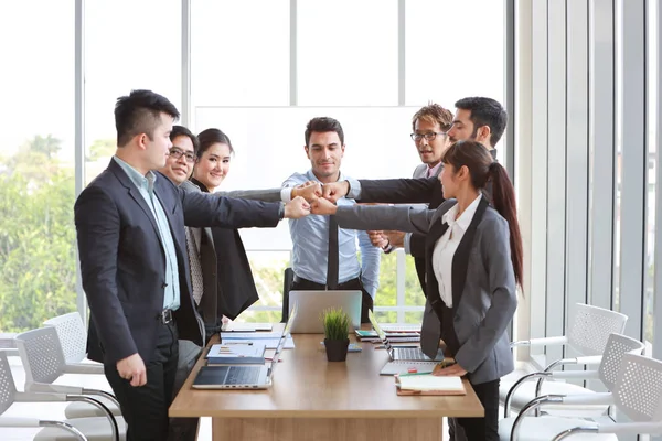 success business deal with fist bump business people hands (teamwork or partnership concept)