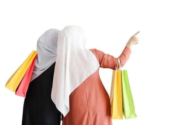 Young muslim girls holding shopping bags isolated and white background — Stock Photo, Image